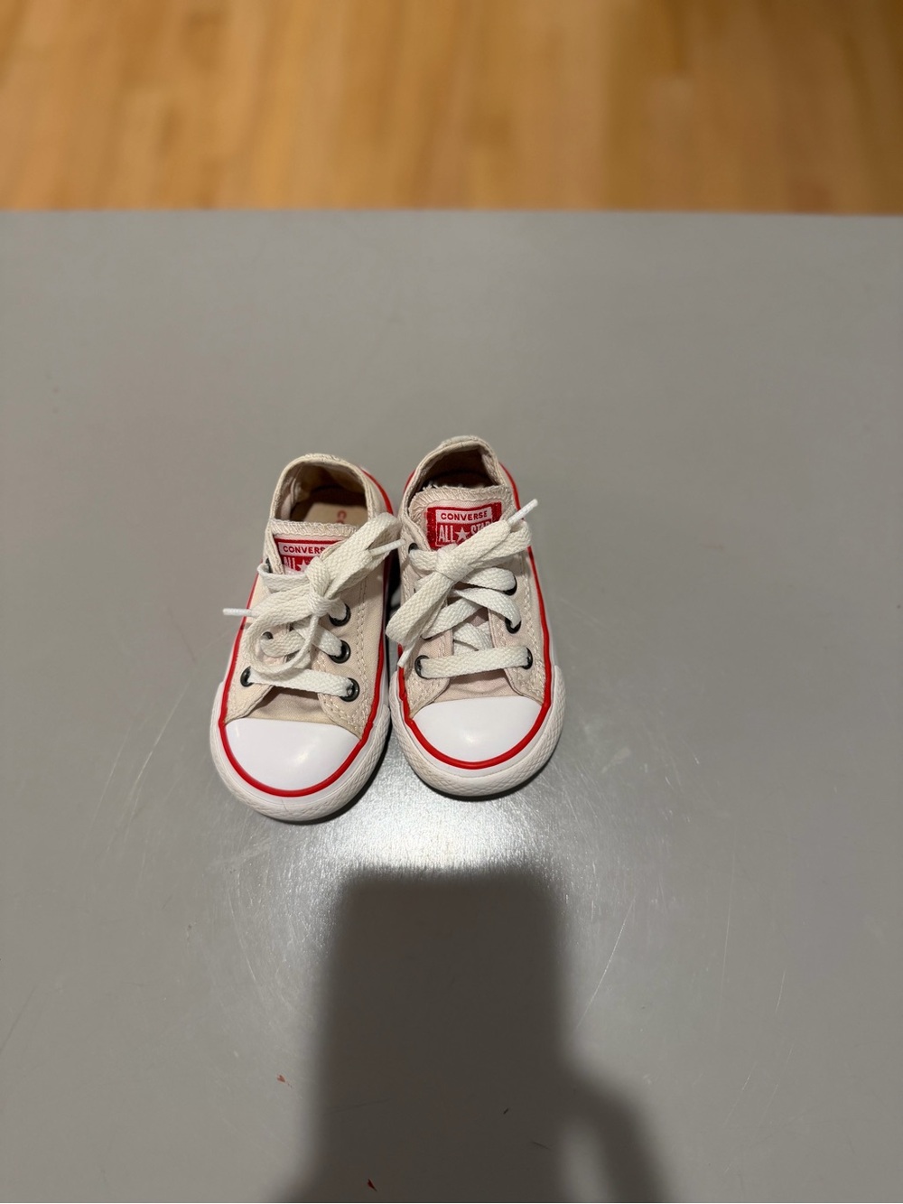Converse Kids Low Top Canvas Sneakers in White with Red Trim